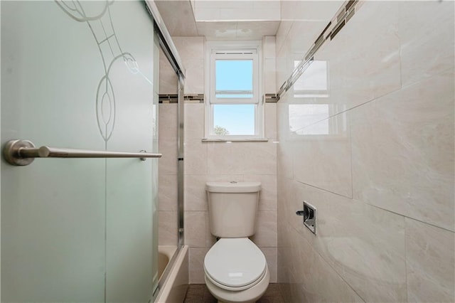 149 Forest St, Staten Island, NY 10314 - bathroom featuring toilet and combined bath / shower with glass door