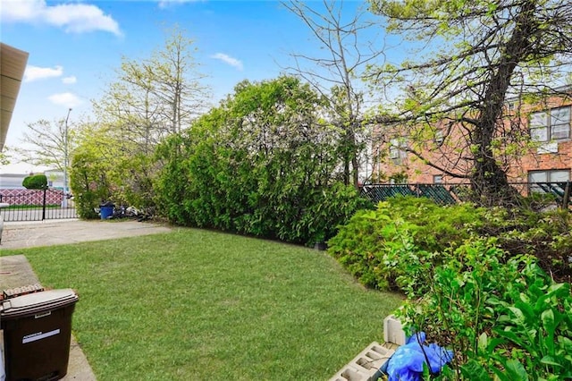 view of yard with fence