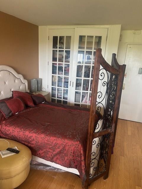 bedroom with wood finished floors