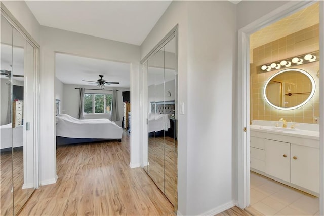 30 Beverly Rd, Staten Island, NY 10305 - bathroom with ensuite bath, vanity, a ceiling fan, and wood finished floors