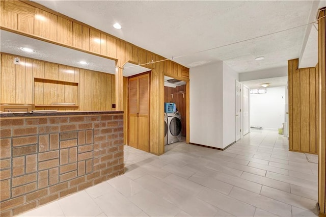 30 Beverly Rd, Staten Island, NY 10305 - kitchen featuring wooden walls, a textured ceiling, separate washer and dryer, and recessed lighting