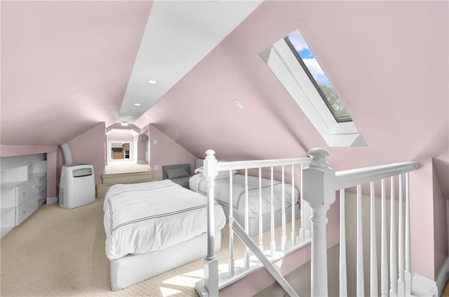 carpeted bedroom featuring recessed lighting and vaulted ceiling with skylight
