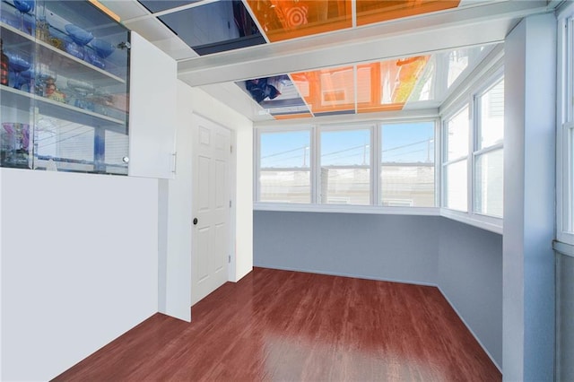 empty room with dark wood-style floors