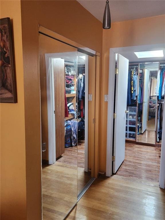 corridor with wood finished floors