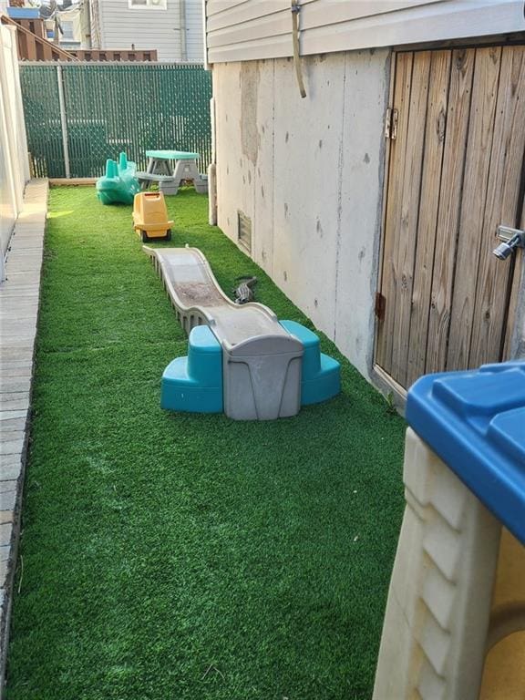 view of yard with fence