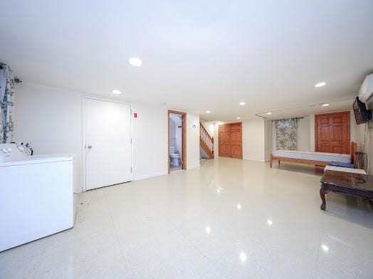 299 Bay 13th St, Brooklyn, NY 11214 - finished basement featuring stairway, washer and clothes dryer, and recessed lighting