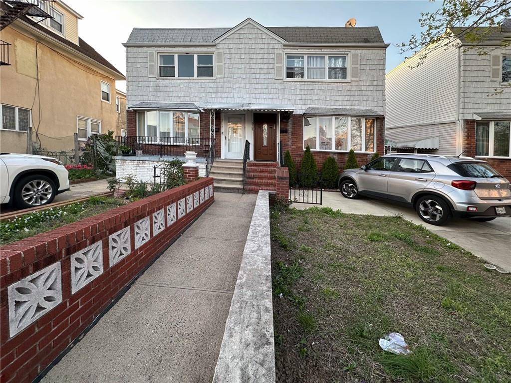 3705 Lyme Ave, Brooklyn, NY 11224 - view of front facade featuring brick siding