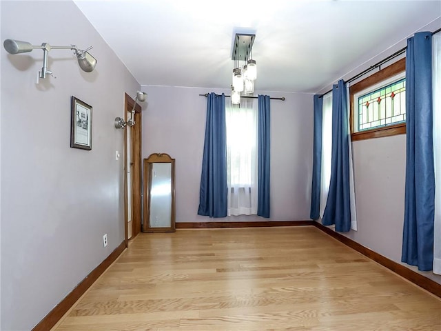 333 Lafayette Ave, Staten Island, NY 10301 - unfurnished room with healthy amount of natural light, light wood finished floors, and baseboards
