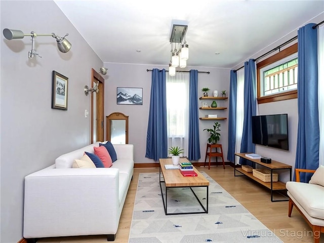 333 Lafayette Ave, Staten Island, NY 10301 - living room featuring healthy amount of natural light and light wood-style floors