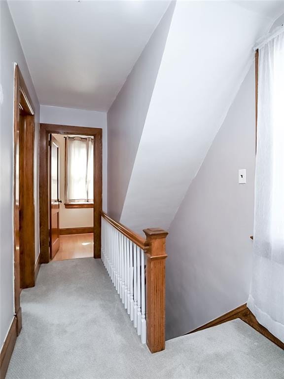 333 Lafayette Ave, Staten Island, NY 10301 - corridor with light colored carpet, vaulted ceiling, and baseboards