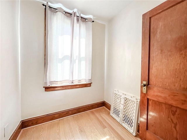 333 Lafayette Ave, Staten Island, NY 10301 - empty room featuring healthy amount of natural light, wood finished floors, and baseboards