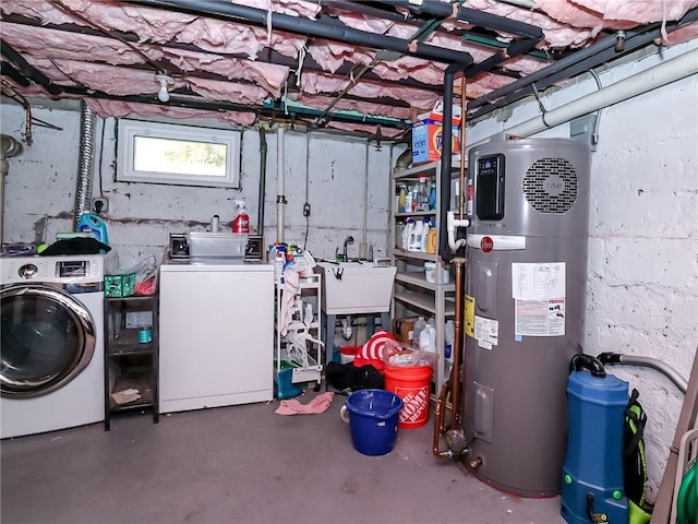 333 Lafayette Ave, Staten Island, NY 10301 - basement featuring separate washer and dryer, hybrid water heater, and a sink
