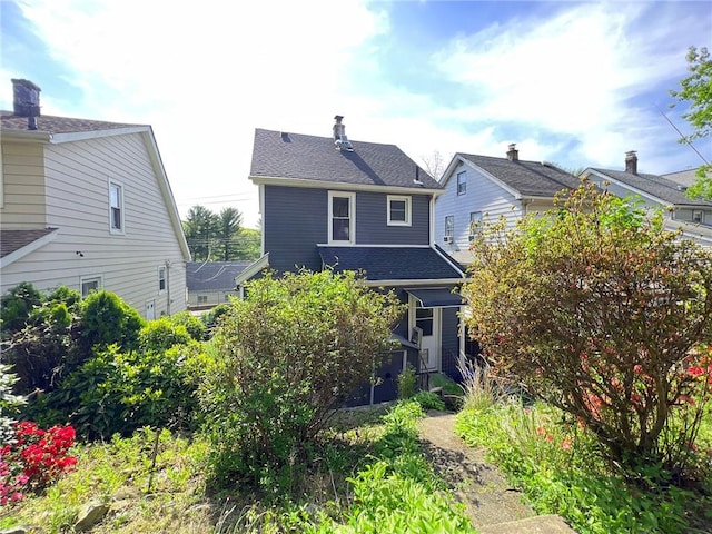 333 Lafayette Ave, Staten Island, NY 10301 - rear view of property with roof with shingles