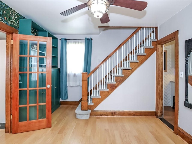 333 Lafayette Ave, Staten Island, NY 10301 - foyer entrance with wood finished floors, ceiling fan, stairs, and baseboards