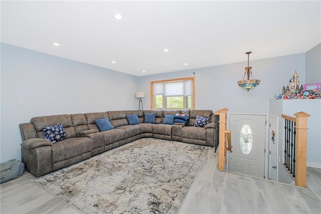 living room featuring recessed lighting and light wood finished floors