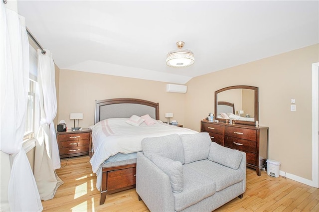 bedroom featuring baseboards and light wood-style flooring