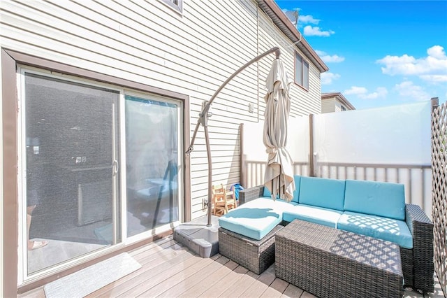 wooden deck with outdoor lounge area