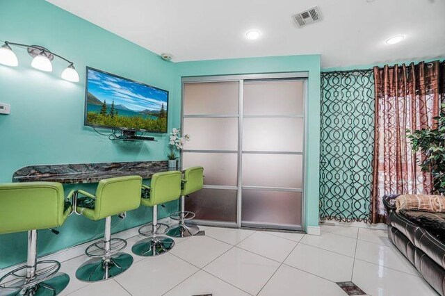 office area with visible vents and recessed lighting