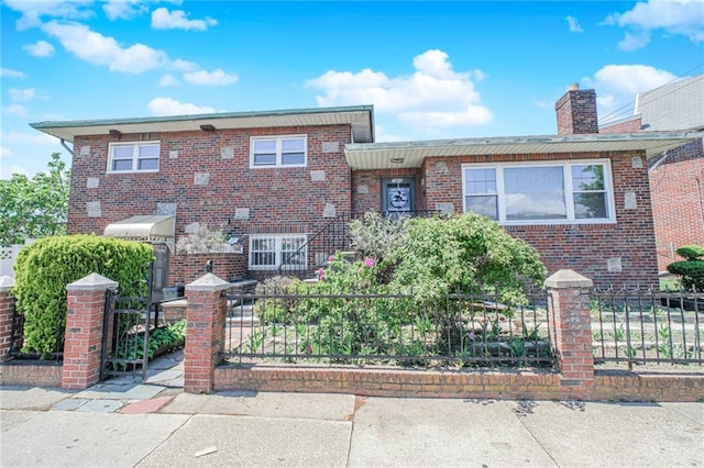 1960 Stillwell Ave, Brooklyn, NY 11223 - view of front of home with a fenced front yard and brick siding