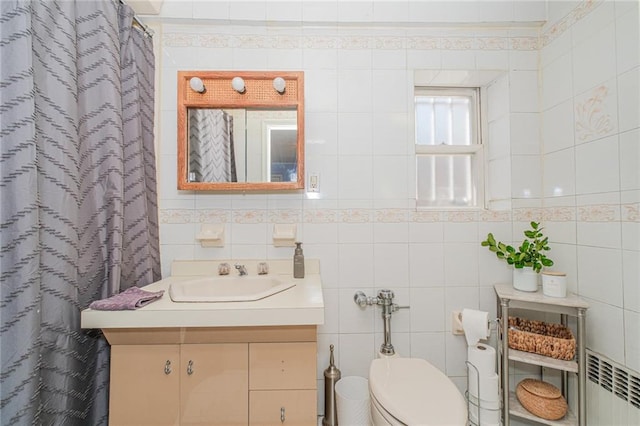 1960 Stillwell Ave, Brooklyn, NY 11223 - bathroom with vanity, radiator heating unit, tile walls, and a shower with curtain
