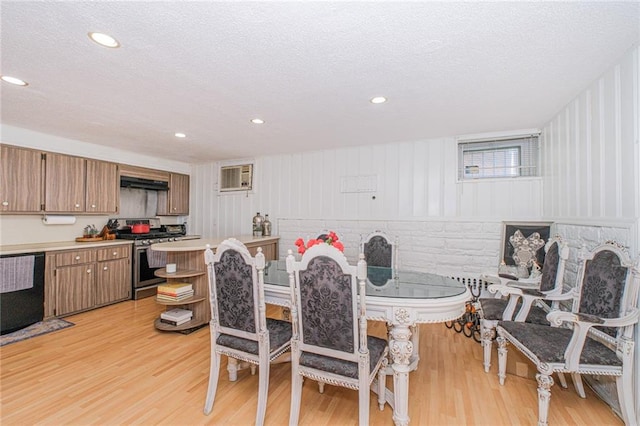 1960 Stillwell Ave, Brooklyn, NY 11223 - dining area with light wood-style flooring, a textured ceiling, and recessed lighting