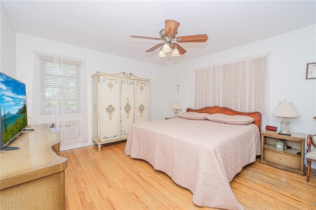 1960 Stillwell Ave, Brooklyn, NY 11223 - bedroom featuring light wood-type flooring and ceiling fan