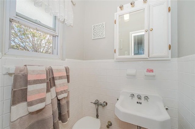 1960 Stillwell Ave, Brooklyn, NY 11223 - bathroom featuring tile walls and wainscoting