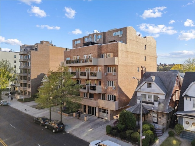 2408 Ocean Ave Unit 12, Brooklyn, NY 11229 - view of apartment building / complex featuring a garage