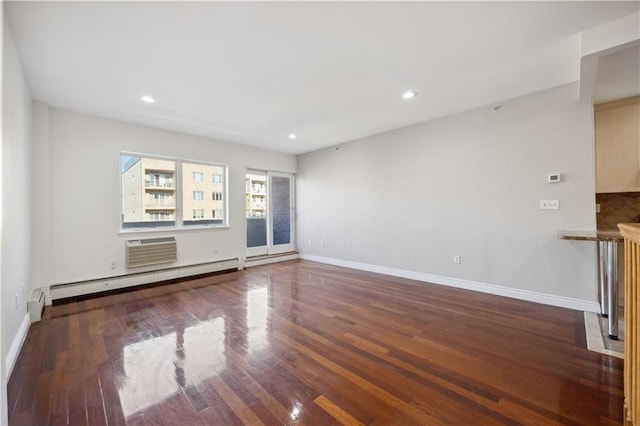 unfurnished living room featuring baseboards, a baseboard radiator, recessed lighting, and wood finished floors