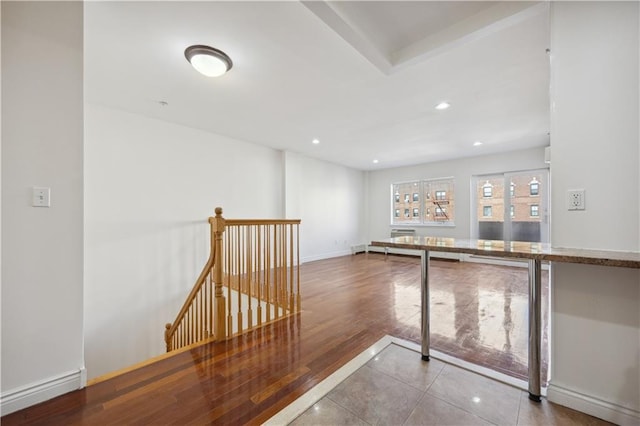 2408 Ocean Ave Unit 12, Brooklyn, NY 11229 - tiled spare room with baseboards and recessed lighting