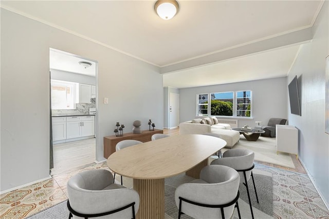 1265 E 92nd St, Brooklyn, NY 11236 - dining room with plenty of natural light, baseboards, and ornamental molding