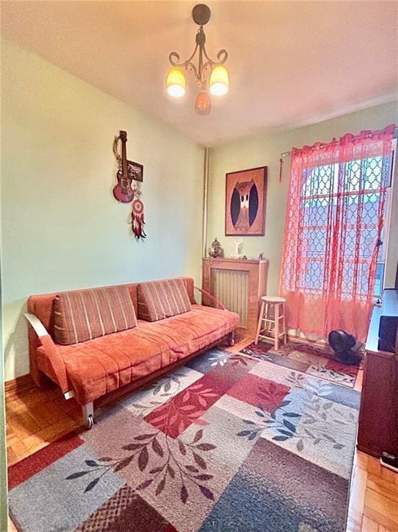 living room with an inviting chandelier