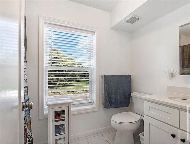 3626 Bayview Ave, Brooklyn, NY 11224 - bathroom featuring vanity, toilet, tile patterned flooring, baseboards, and a shower with curtain