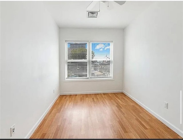 3626 Bayview Ave, Brooklyn, NY 11224 - spare room featuring light wood-style flooring, baseboards, and ceiling fan