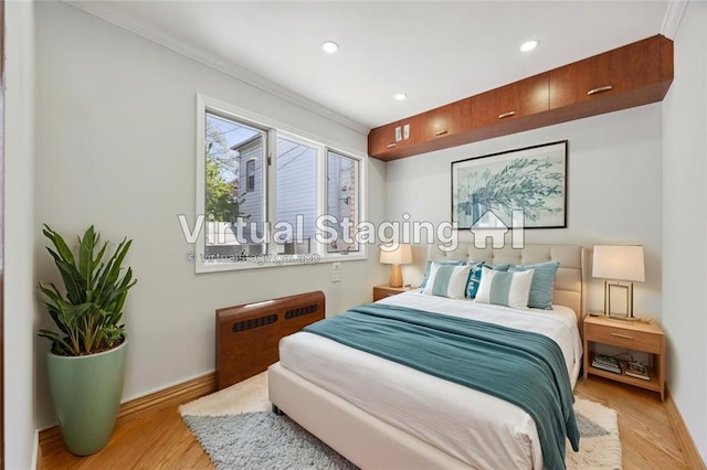 2680 E 23rd St, Brooklyn, NY 11235 - bedroom with baseboards, crown molding, and wood finished floors
