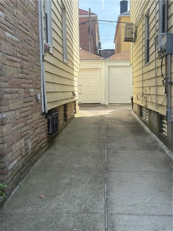 1032 68th St, Brooklyn, NY 11219 - view of side of property with driveway