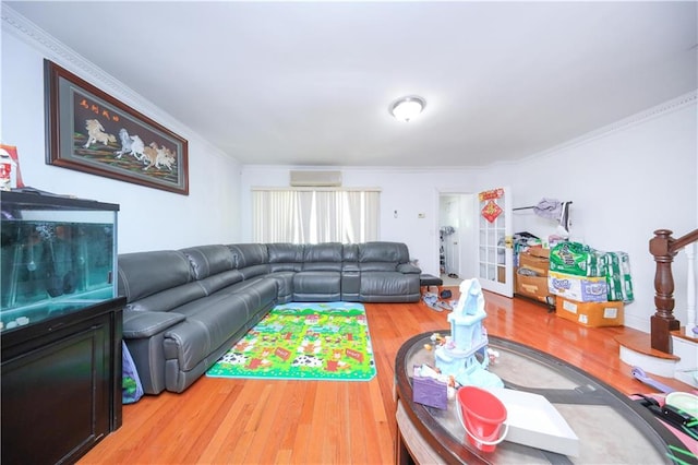 2046 Stuart St, Brooklyn, NY 11229 - living area with a wall mounted AC, wood finished floors, and ornamental molding
