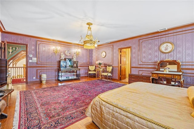 3821 Avenue S, Brooklyn, NY 11234 - bedroom featuring wallpapered walls, visible vents, a chandelier, crown molding, and wood finished floors