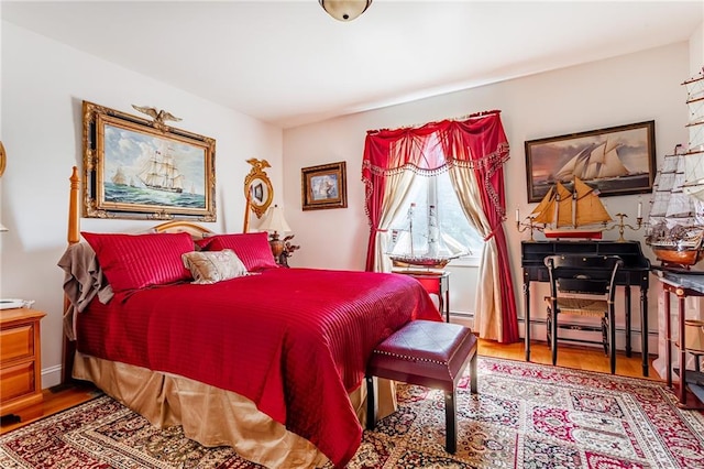 bedroom featuring wood finished floors
