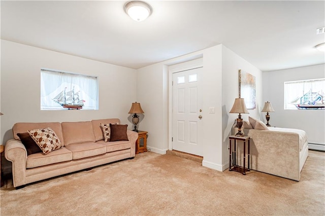 living room with baseboards, visible vents, and light carpet