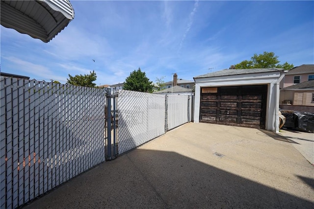 exterior space with fence and a gate