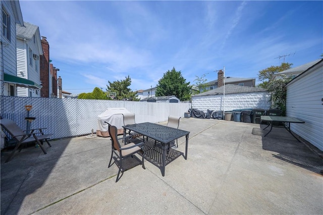 view of patio / terrace with outdoor dining area and a fenced backyard