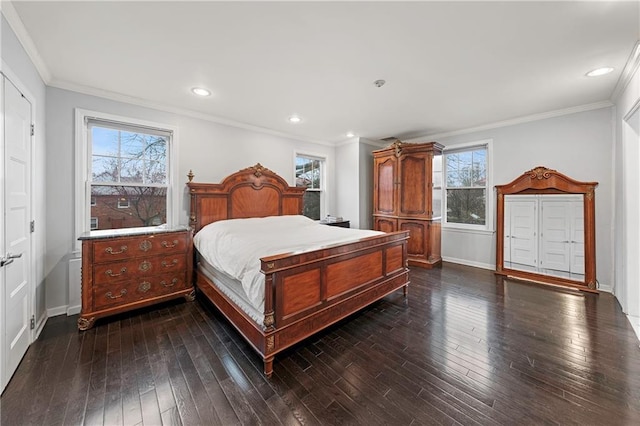bedroom featuring baseboards, ornamental molding, dark wood-type flooring, and recessed lighting