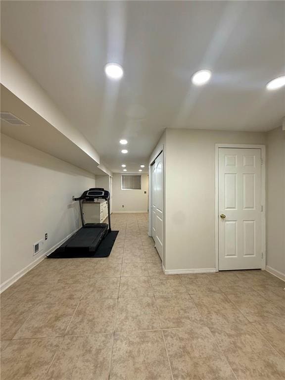 interior space with light tile patterned floors, baseboards, recessed lighting, and visible vents