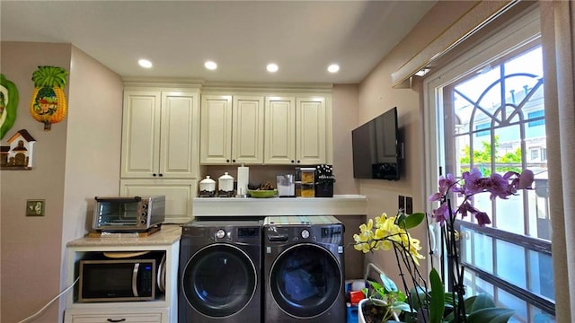 washroom with a toaster, recessed lighting, and washer and dryer