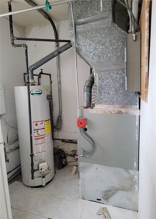 2878 W 31st St, Brooklyn, NY 11224 - utility room with gas water heater and heating unit