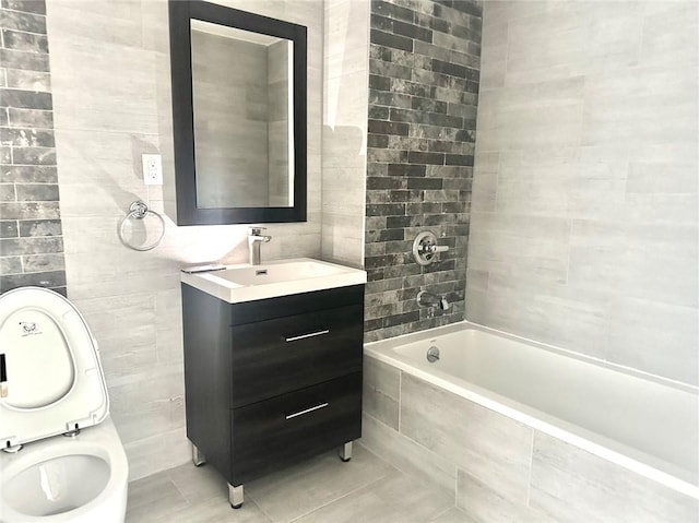 70-09 45th Ave Unit 7C, Woodside, NY 11377 - full bathroom with tiled shower / bath combo, tile walls, tile patterned floors, and vanity
