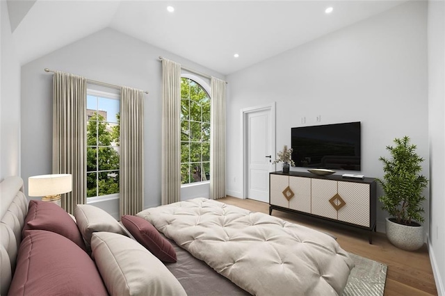 227 77th St, Brooklyn, NY 11209 - bedroom with vaulted ceiling, wood finished floors, and recessed lighting