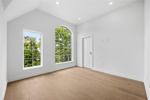 227 77th St, Brooklyn, NY 11209 - empty room with light wood-style flooring, recessed lighting, and lofted ceiling
