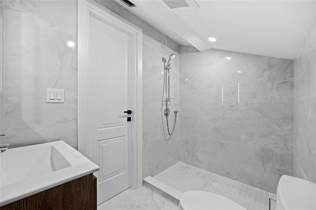 227 77th St, Brooklyn, NY 11209 - bathroom featuring tiled shower, vanity, and marble finish floors